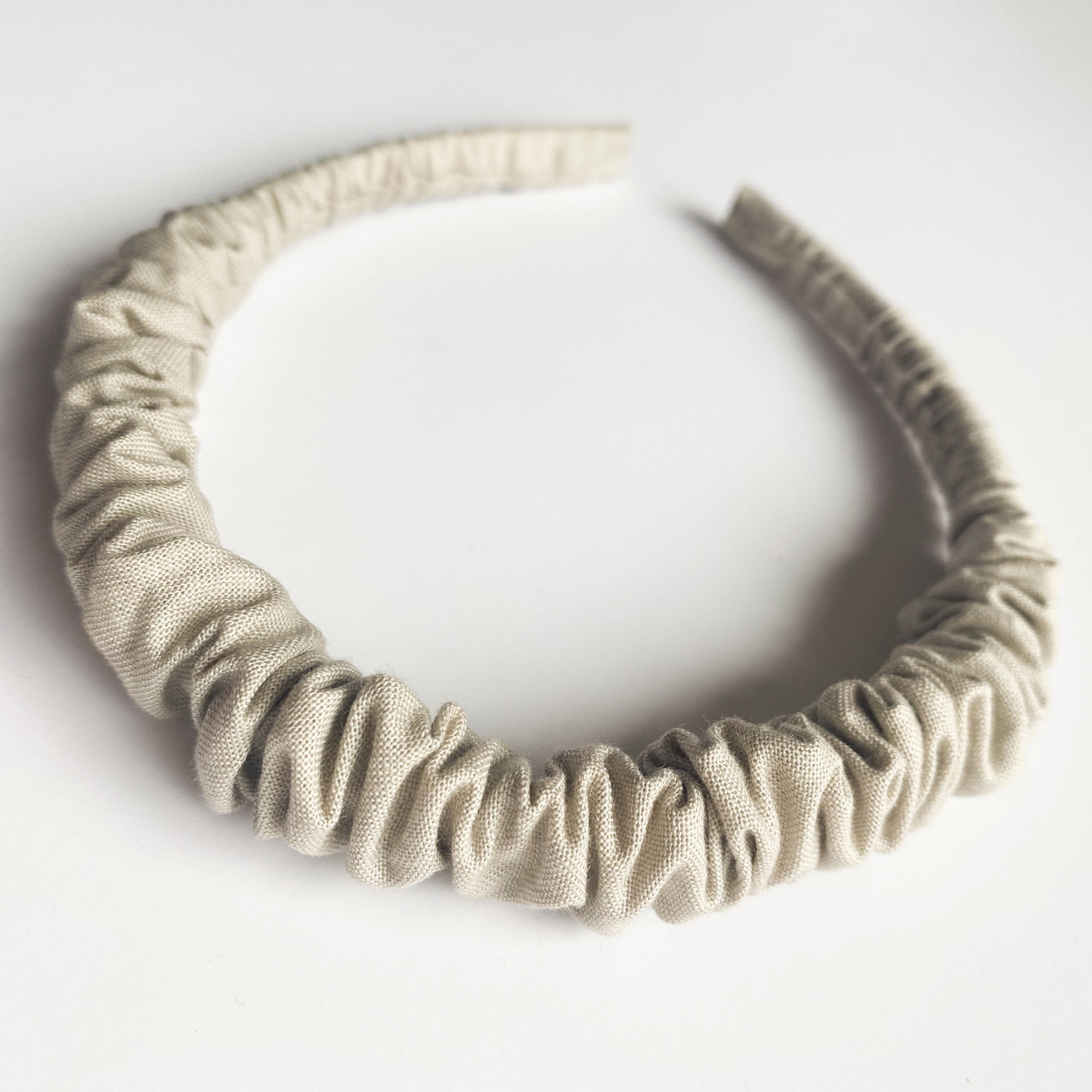 Cintillo repollito   -  Arena