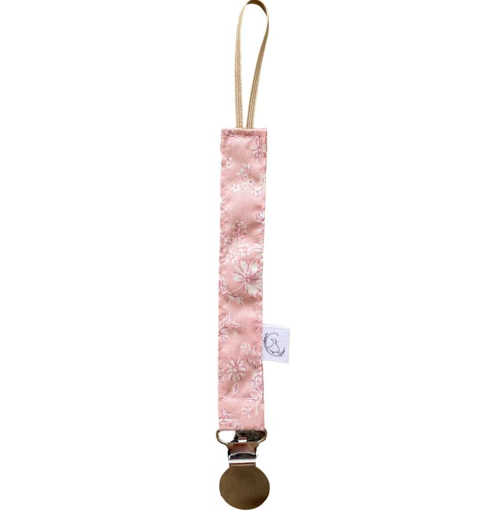 Porta chupete - Rosa pálido flores blancas