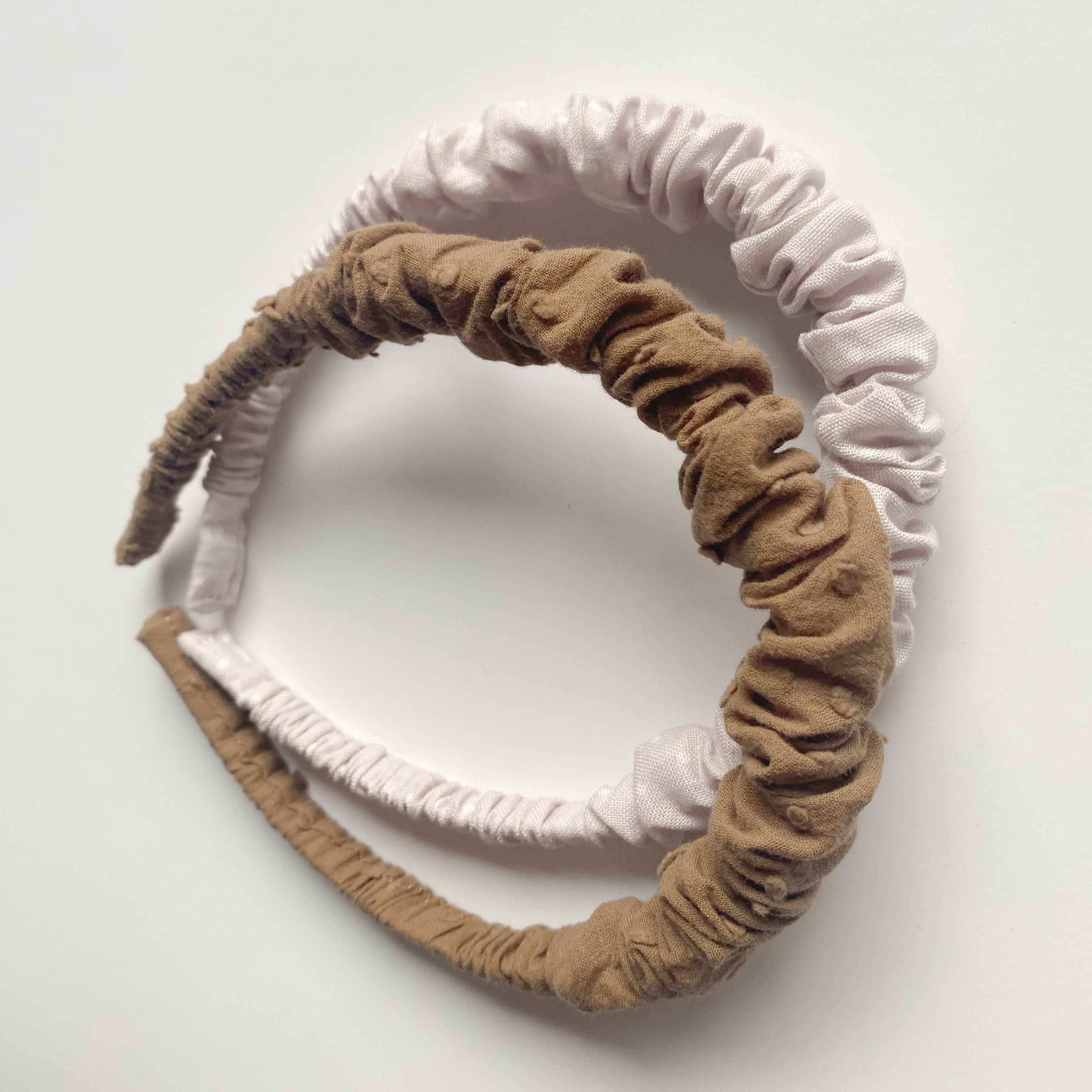 Cintillo repollito   -  Plumeti Café