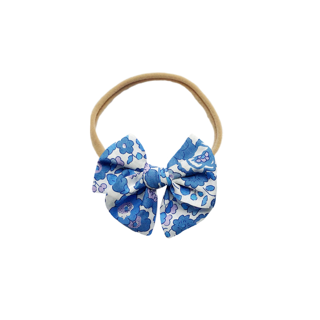 Cintillo Mini malva  flores azules