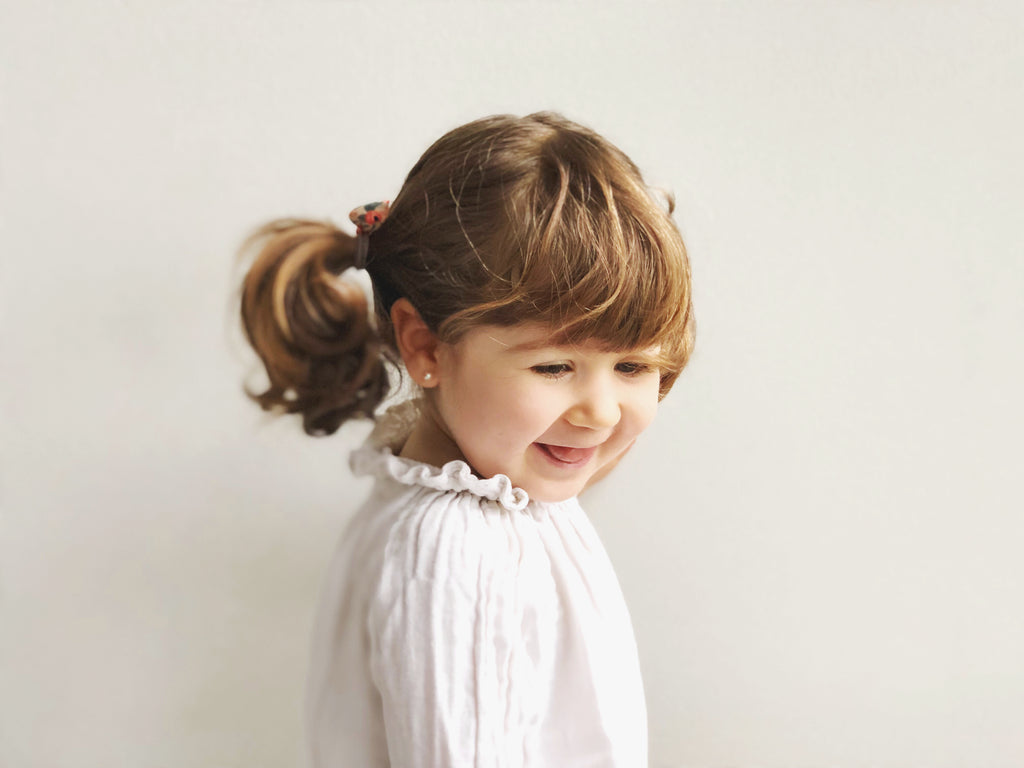 Orejita de oso - Flores coral